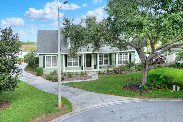 view of front facade with a front lawn