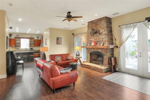 1935 Austin Ter, Winter Haven, FL 33884 - living room featuring a ceiling fan, visible vents, and dark wood-style floors