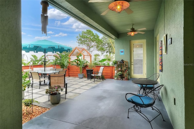 1935 Austin Ter, Winter Haven, FL 33884 - view of patio with fence, outdoor dining space, and a ceiling fan