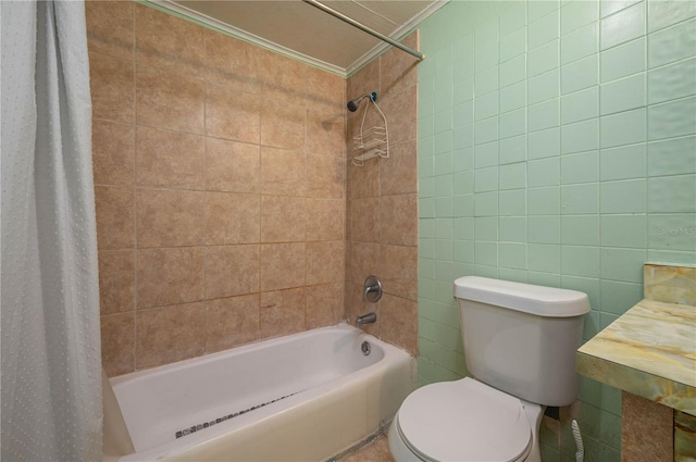 bathroom featuring ornamental molding, toilet, shower / tub combo, and tile walls