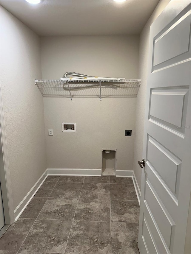 washroom with hookup for an electric dryer and washer hookup