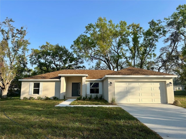 ranch-style home featuring an attached garage, driveway, a front lawn, and stucco siding