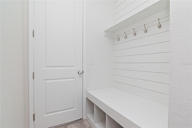 mudroom with light hardwood / wood-style flooring