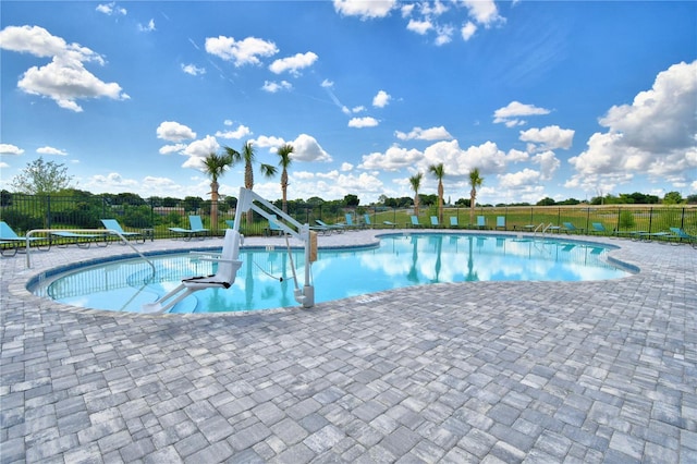 view of swimming pool featuring a patio