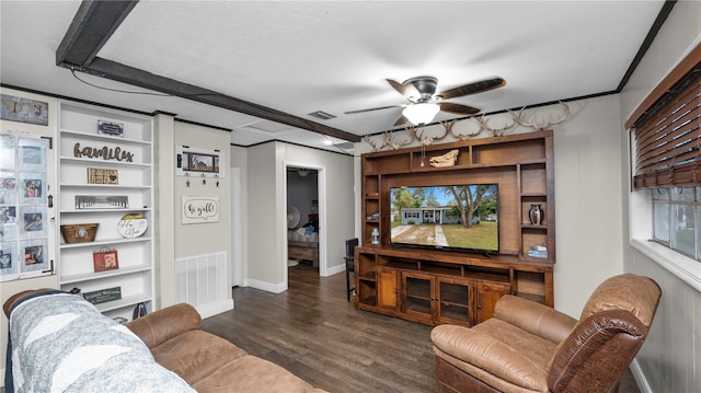 living room featuring ceiling fan, a textured ceiling, and dark hardwood / wood-style floors