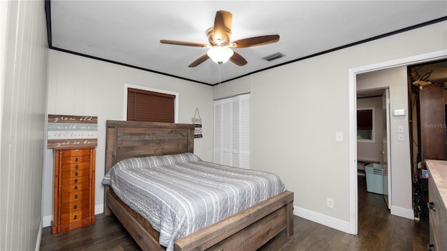 bedroom with ceiling fan, a closet, and dark hardwood / wood-style flooring