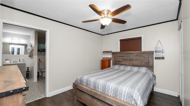 bedroom with dark hardwood / wood-style flooring, ceiling fan, and crown molding