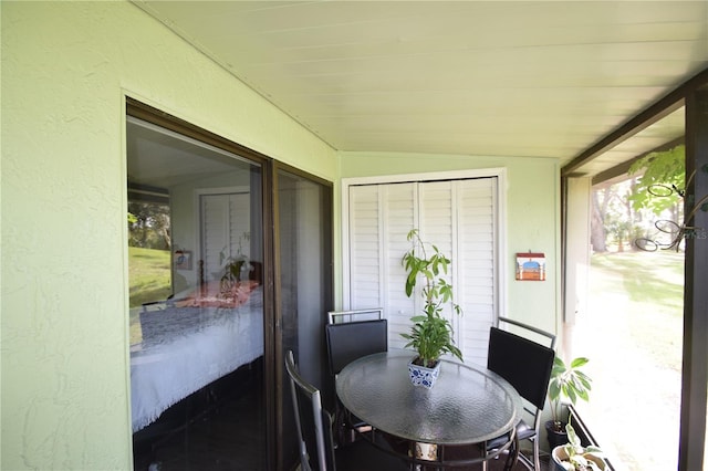 interior space featuring vaulted ceiling