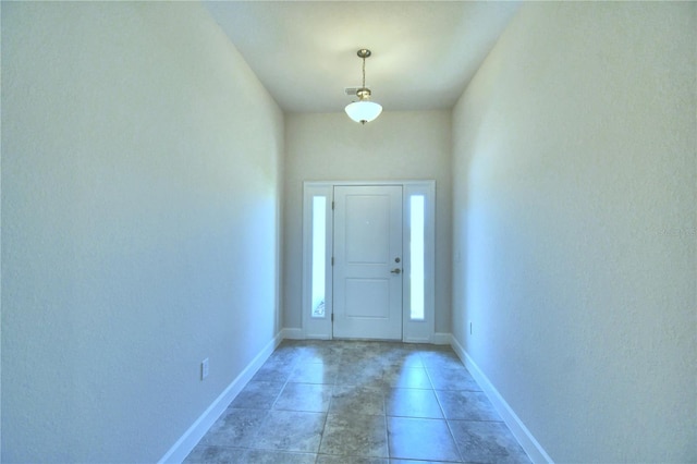 entryway featuring tile patterned flooring