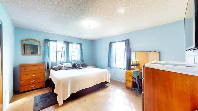 bedroom with a textured ceiling