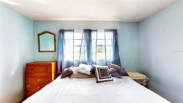 bedroom with a textured ceiling