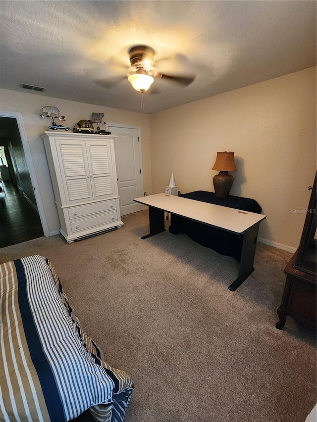 carpeted bedroom with ceiling fan