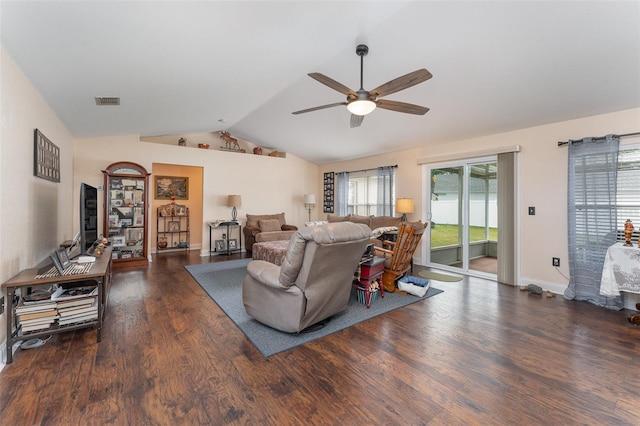 living room featuring ceiling fan, vaulted ceiling, and dark hardwood / wood-style flooring