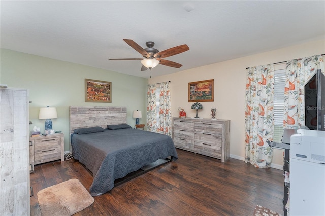 bedroom featuring ceiling fan and dark hardwood / wood-style flooring