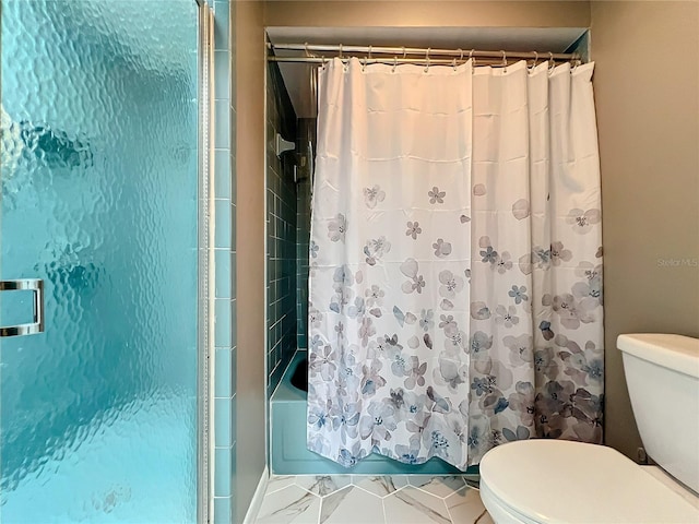 bathroom with toilet, shower / bath combo, and tile patterned floors