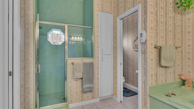 bathroom with toilet, an enclosed shower, and tile patterned floors