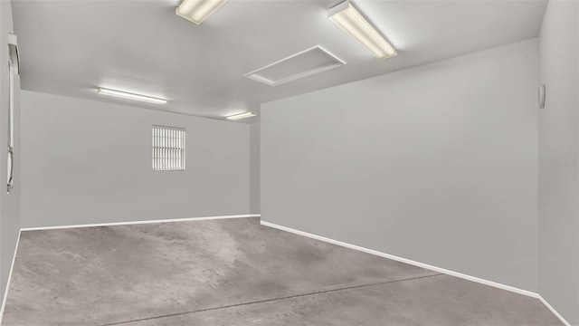 spare room featuring concrete floors