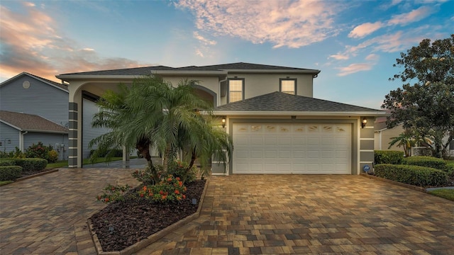 view of front of house with a garage