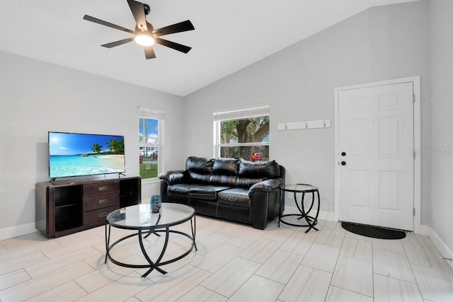 living room featuring high vaulted ceiling and ceiling fan