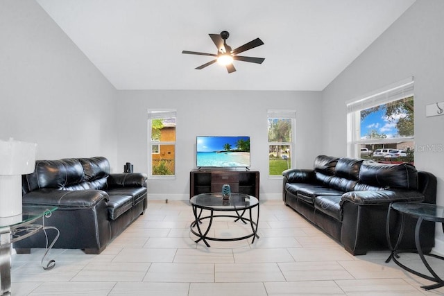 living room with ceiling fan and vaulted ceiling