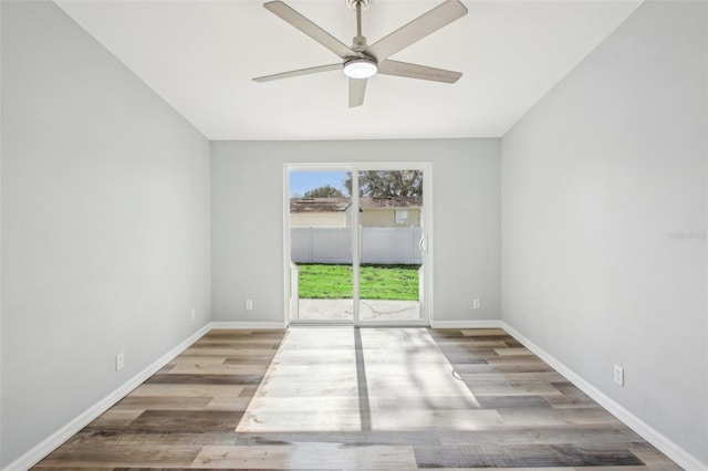 spare room featuring ceiling fan and light hardwood / wood-style flooring