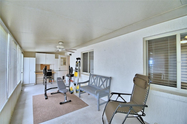 workout room featuring ceiling fan