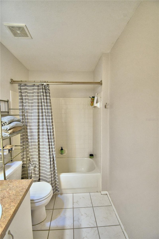 full bathroom featuring vanity, shower / bath combination with curtain, and toilet