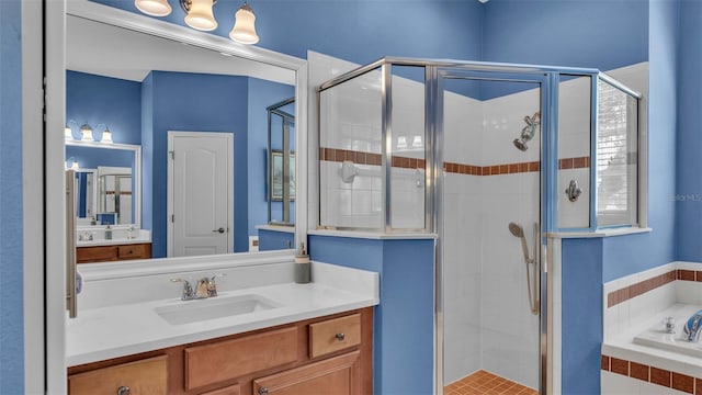 bathroom featuring vanity and plus walk in shower