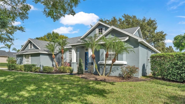 view of front of house with a front lawn