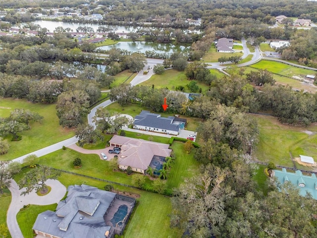 drone / aerial view with a water view