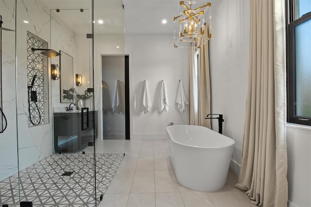 bathroom featuring tile patterned floors, shower with separate bathtub, and sink