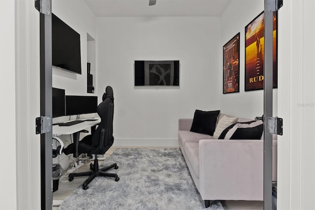 office space with light hardwood / wood-style flooring