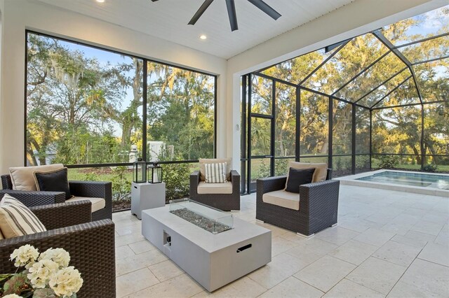 sunroom / solarium with ceiling fan