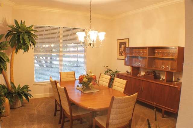 dining space featuring a chandelier, dark colored carpet, and ornamental molding