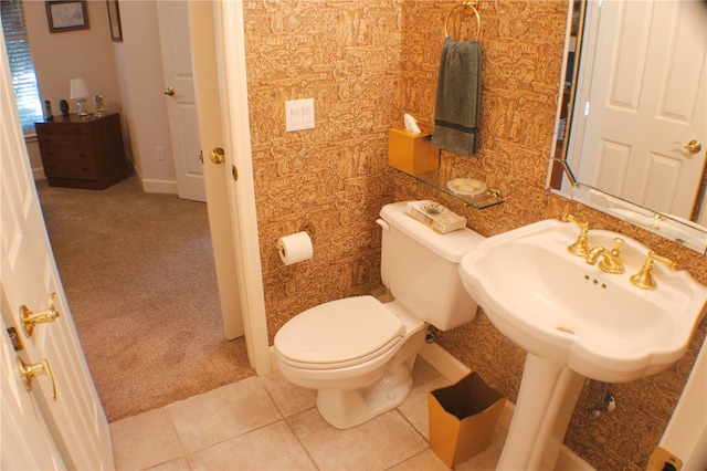 bathroom with tile patterned flooring and toilet