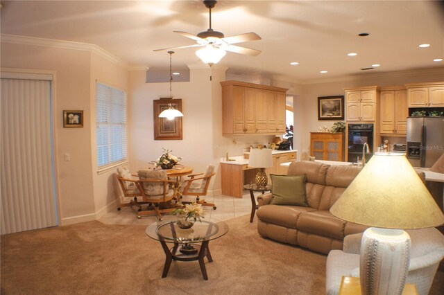 108 Lake Region Blvd N, Winter Haven, FL 33881 - living room featuring ceiling fan, crown molding, recessed lighting, baseboards, and light carpet