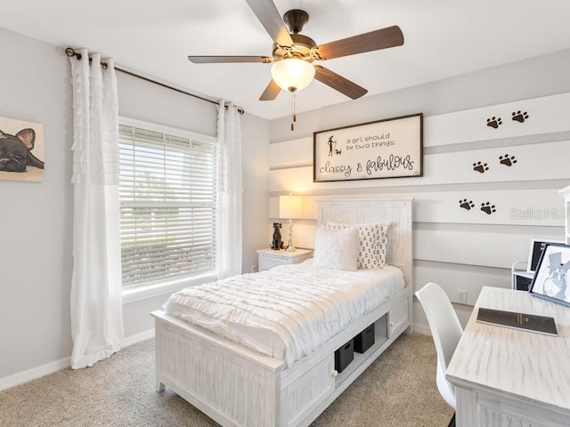 carpeted bedroom featuring ceiling fan