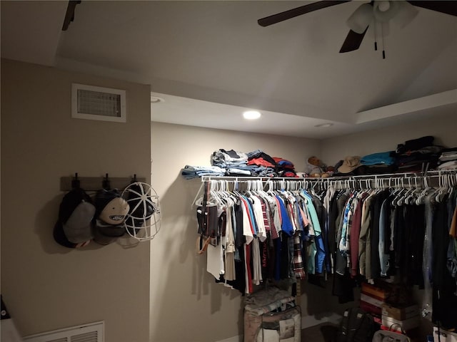 spacious closet with ceiling fan