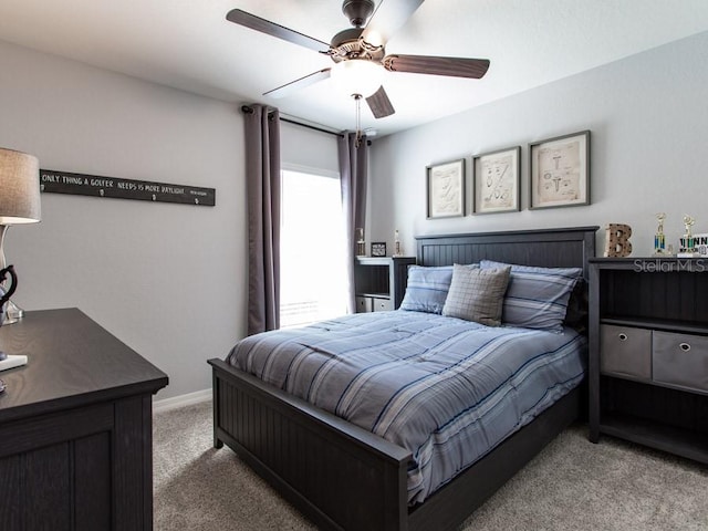 bedroom with light carpet and ceiling fan