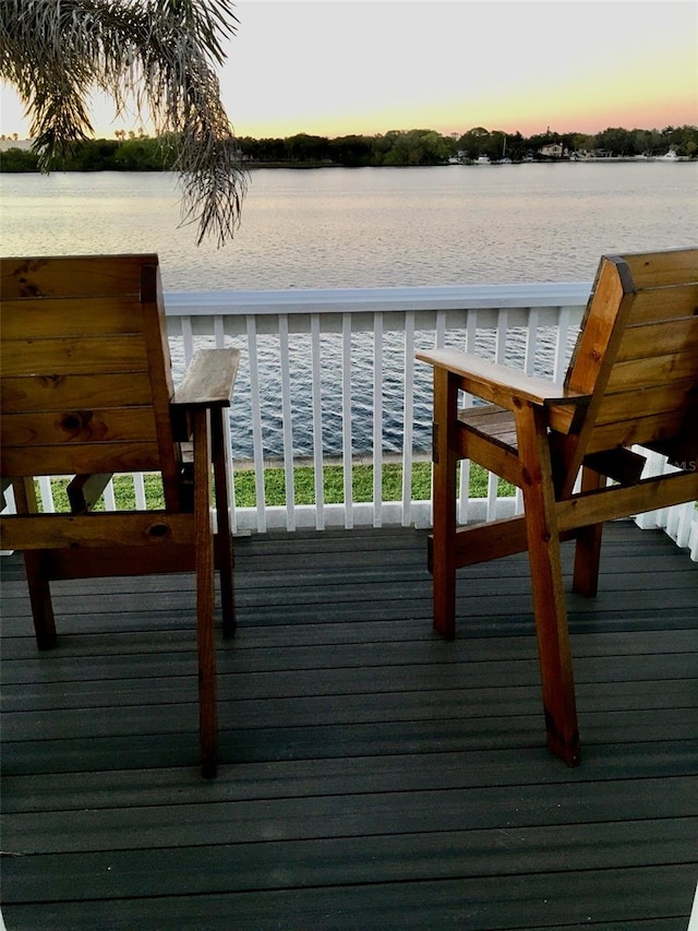 deck at dusk with a water view