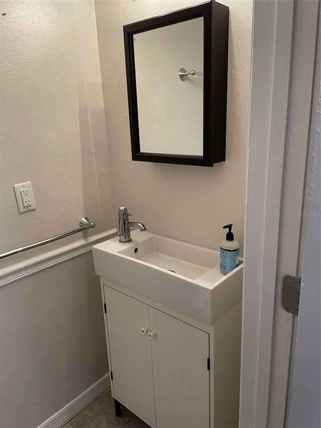 bathroom featuring vanity and tile patterned floors