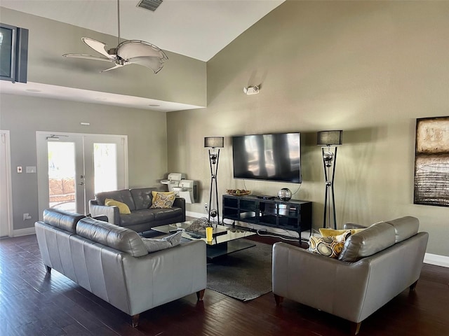 living room featuring french doors, high vaulted ceiling, ceiling fan, and dark wood-type flooring