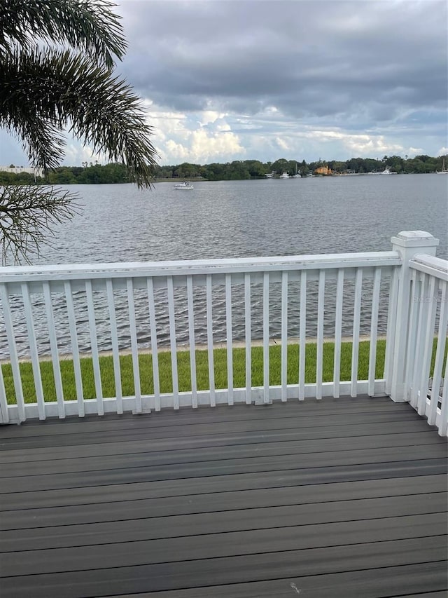 wooden terrace with a water view