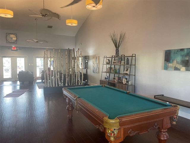 rec room with dark wood-type flooring, high vaulted ceiling, french doors, billiards, and ceiling fan