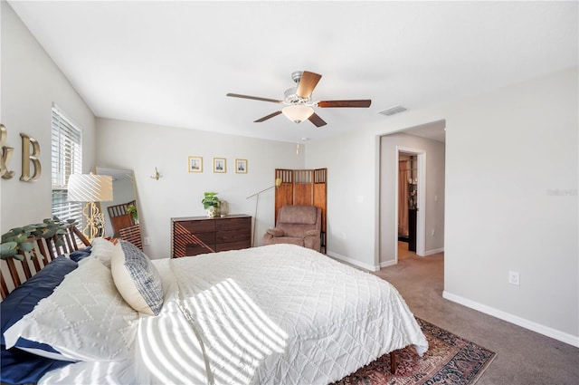 bedroom with ceiling fan and carpet floors