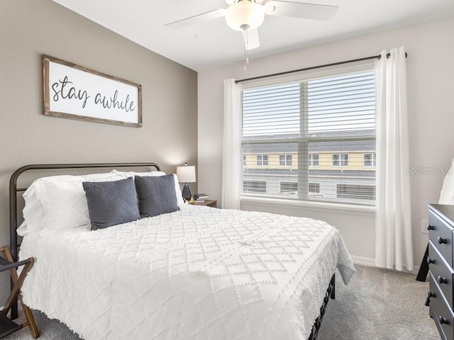 bedroom featuring ceiling fan and carpet flooring