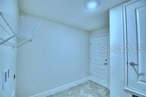 1580 Leamington Ln, Winter Haven, FL 33884 - unfurnished bedroom with baseboards