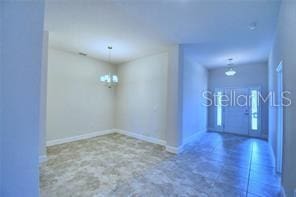 1580 Leamington Ln, Winter Haven, FL 33884 - unfurnished room with baseboards