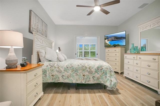 bedroom with light hardwood / wood-style flooring and ceiling fan