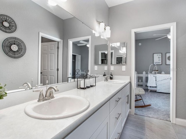 bathroom with vanity and tile patterned flooring